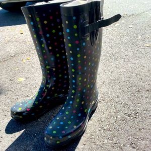 Used heavy rubber rain boots